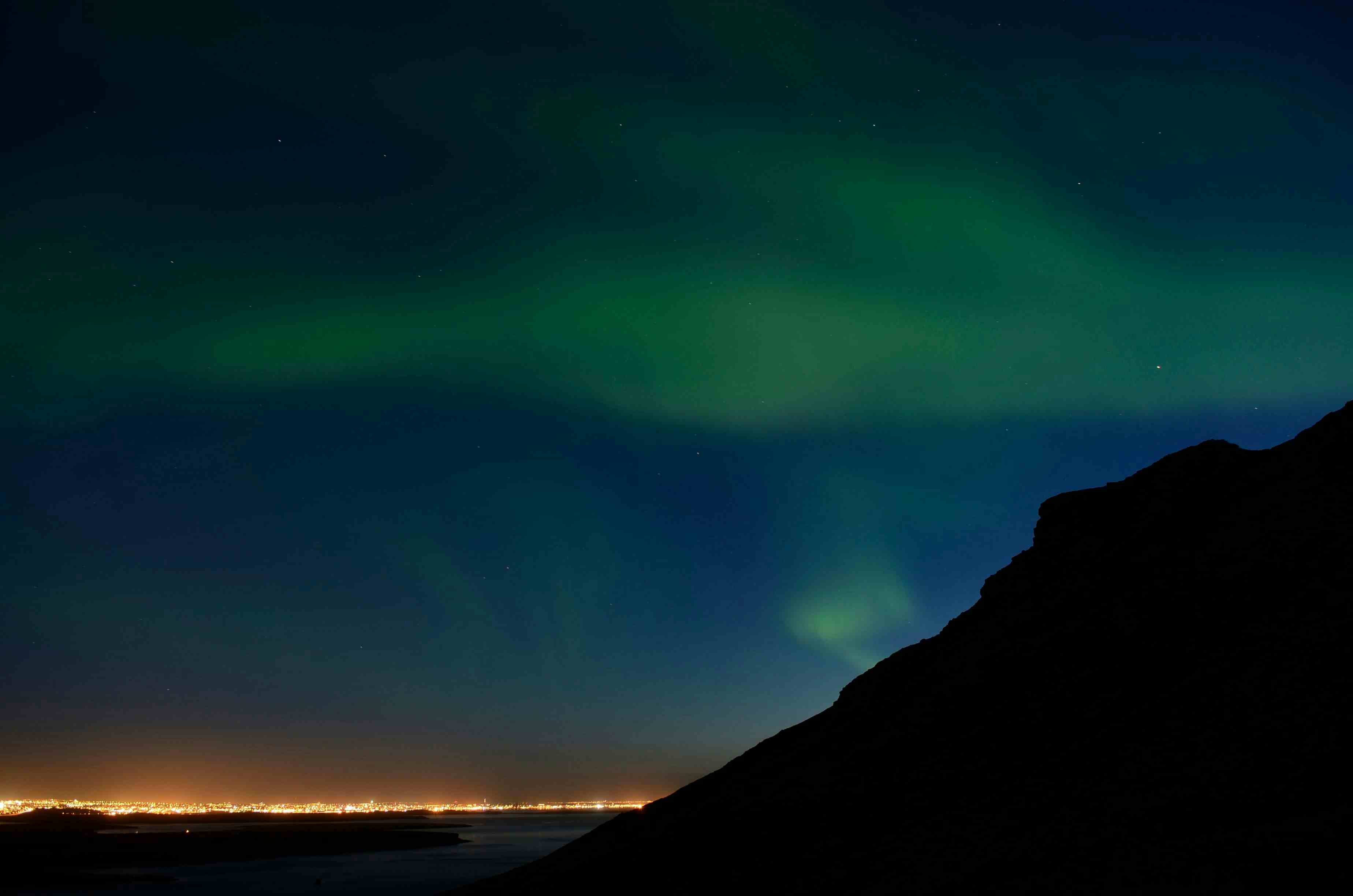 Northern Lights Reykjavík in Background