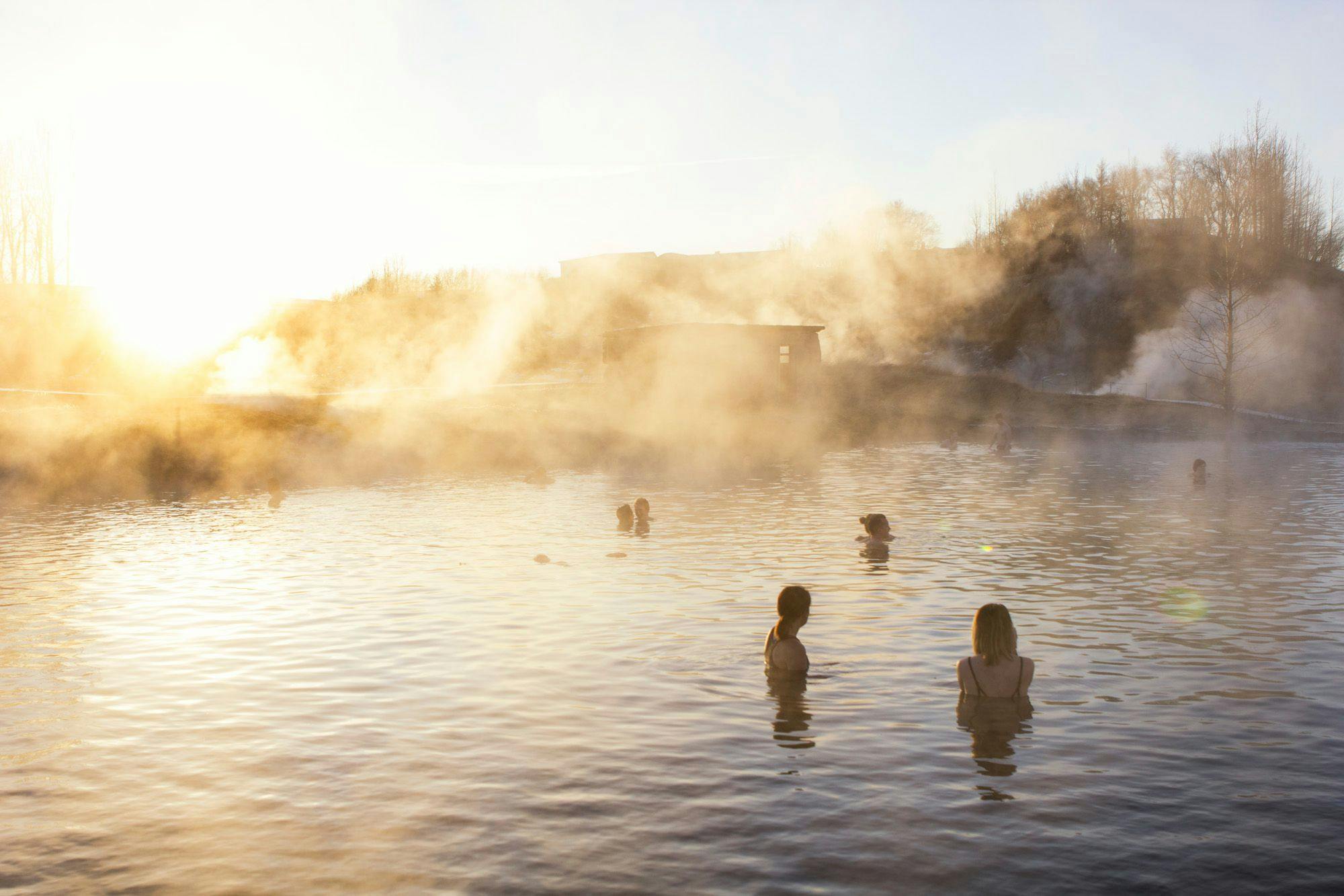 Travelers enjoying Secret lagoon natural hot spring